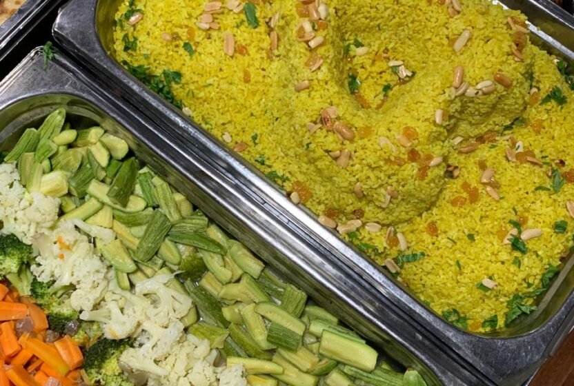 Trays of rice and vegetables at the open buffet on the Nile