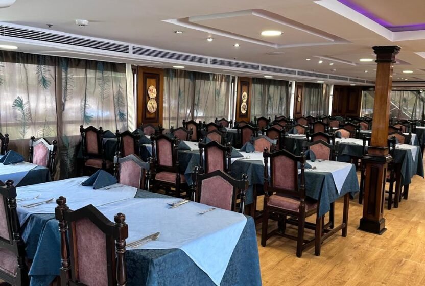 Dining hall with laid tables on the Nile dinner cruise
