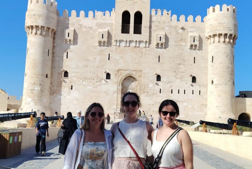 Travellers in front of the Citadel of Qaitbay, Alexandria
