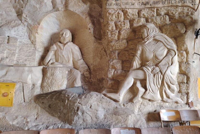 Biblical figures carved into the rock at the Monastery of St. Simon the Tanner
