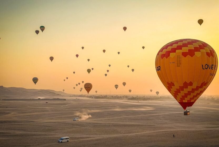 Hot-air balloons over Luxor at sunrise