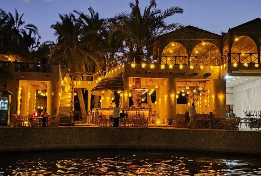 Lodge lit up at night in Siwa Oasis