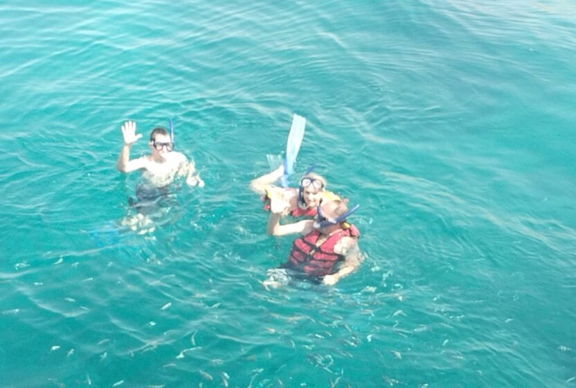Snorkellers in clear Red Sea water at Ain Sokhna